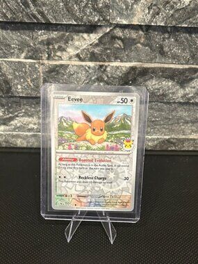 Pokémon Eevee 074/131 “Pokemon Day” Stamped Reverse Cosmos‎ Holo M/NM (2025)
